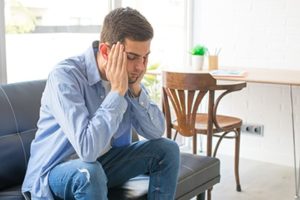man takes a second to pause during outpatient alcohol detox