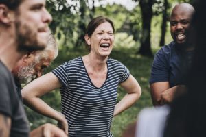 female life coach leads a group session of transitional life coaching